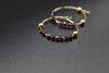 Velvet Ember Garnet gold hoop earrings by Luminous Moon