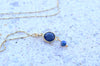 Lapis lazuli pendant necklace with gold accents